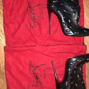 Christian Louboutin Tear Drop Red bottoms